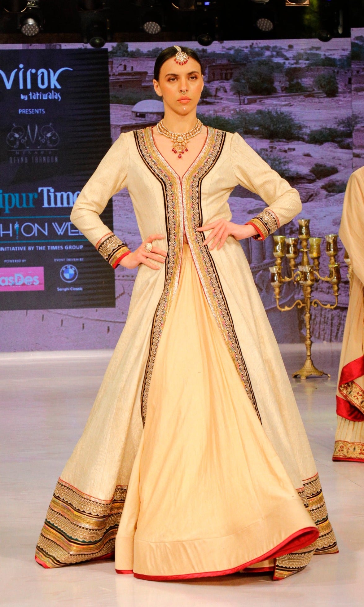 Off White Anarkali with a Gold Skirt.