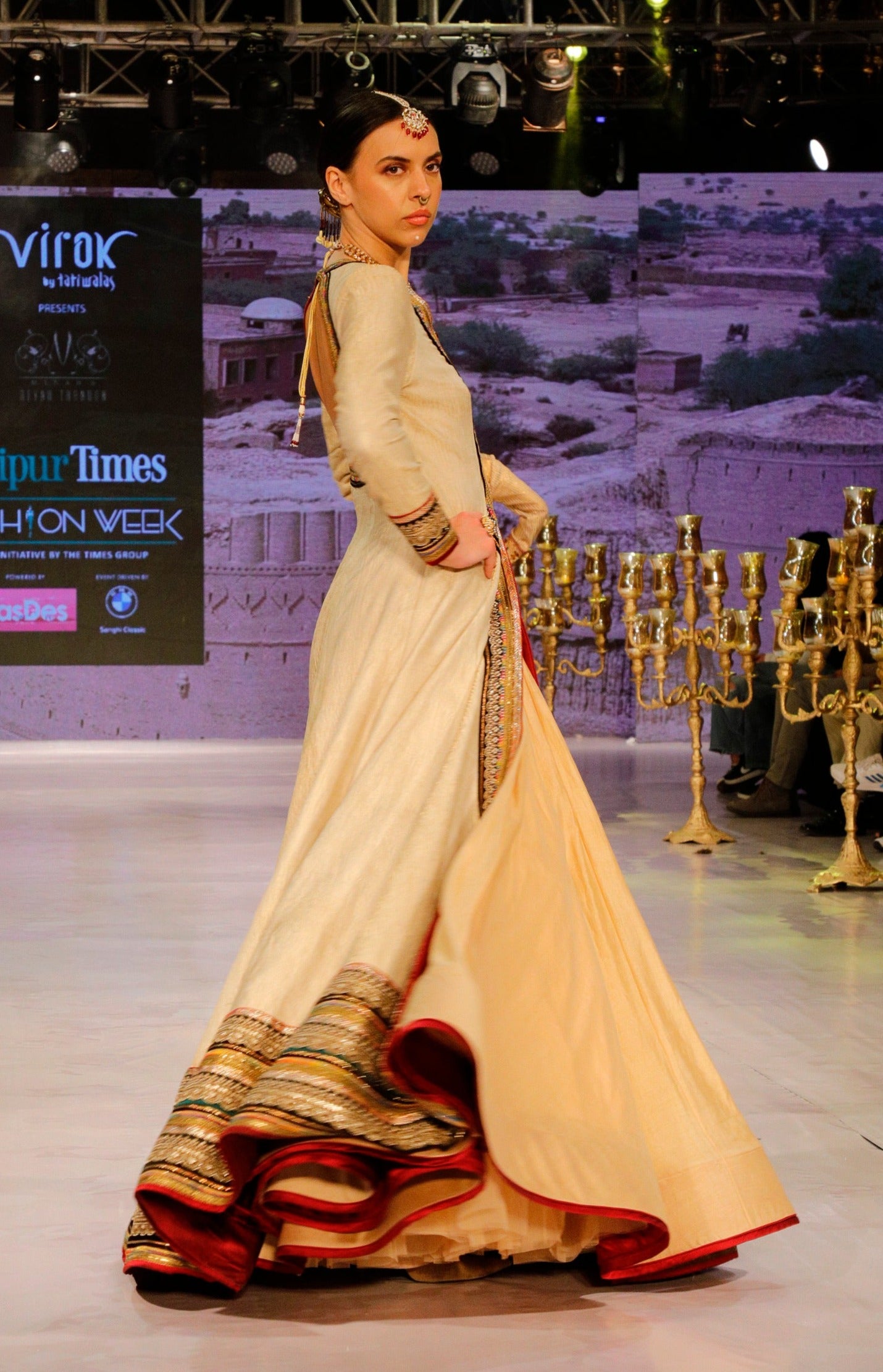 Off White Anarkali with a Gold Skirt.