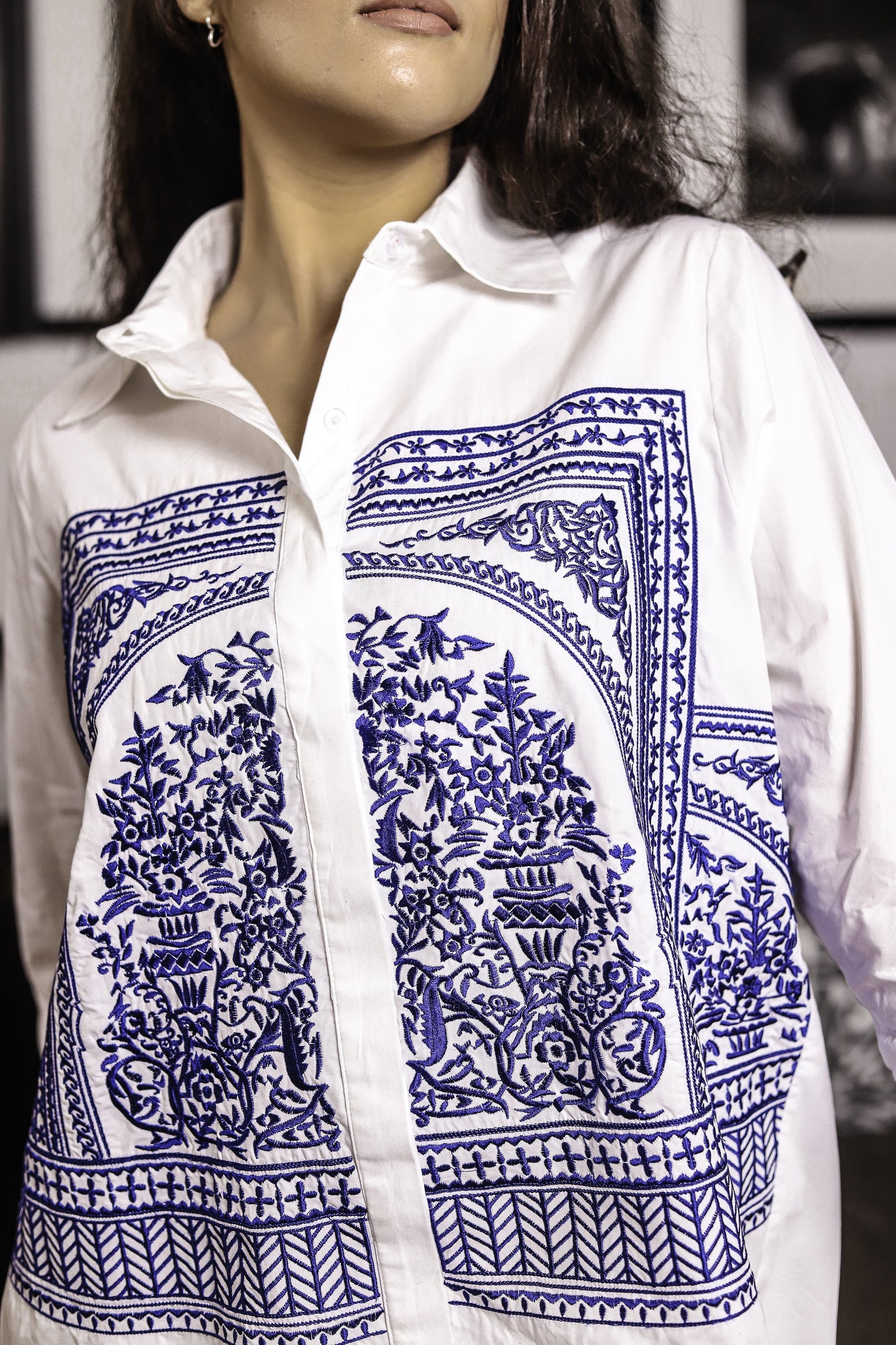 White Shirt with Blue Abstract Thread Design